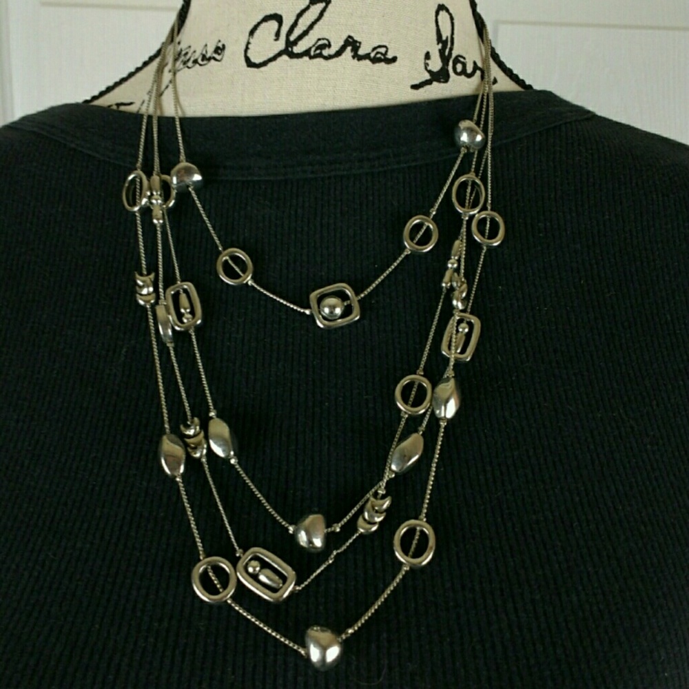 Layered silver tone geometric necklace, 19" long
